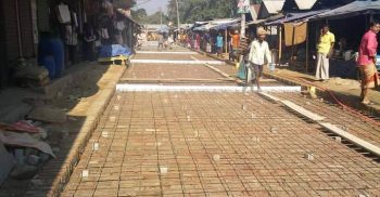 পলাশবাড়ী পৌরসভার রাস্তায় সিসি ঢালাইয়ে পুরাতন ইট ব্যবহারের অভিযোগ