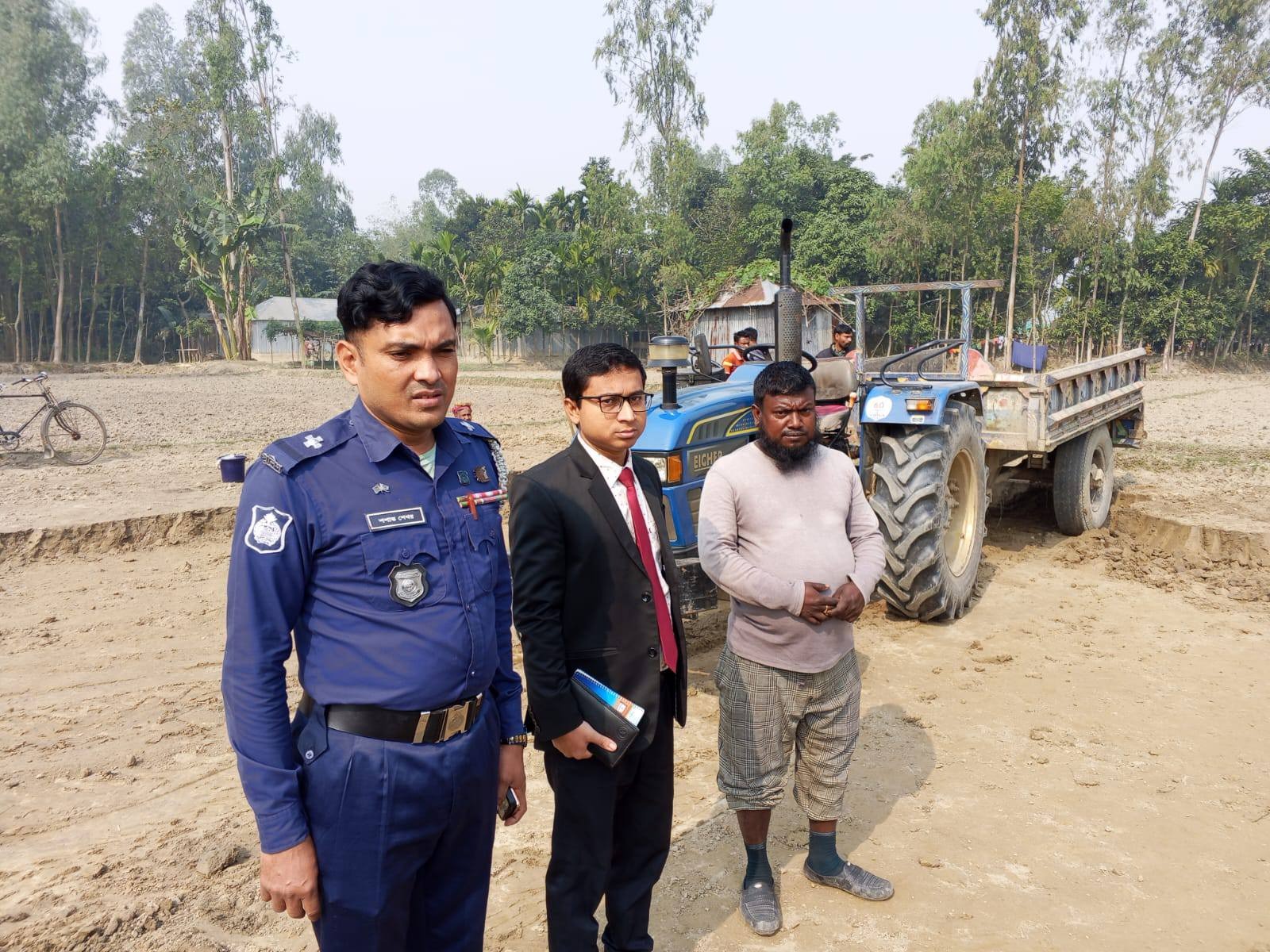 আবাদি জমির টপসয়েল কাটার অভিযোগে আটক